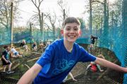 Boy Smiling on sky nets at Robin Hill Adventure Park