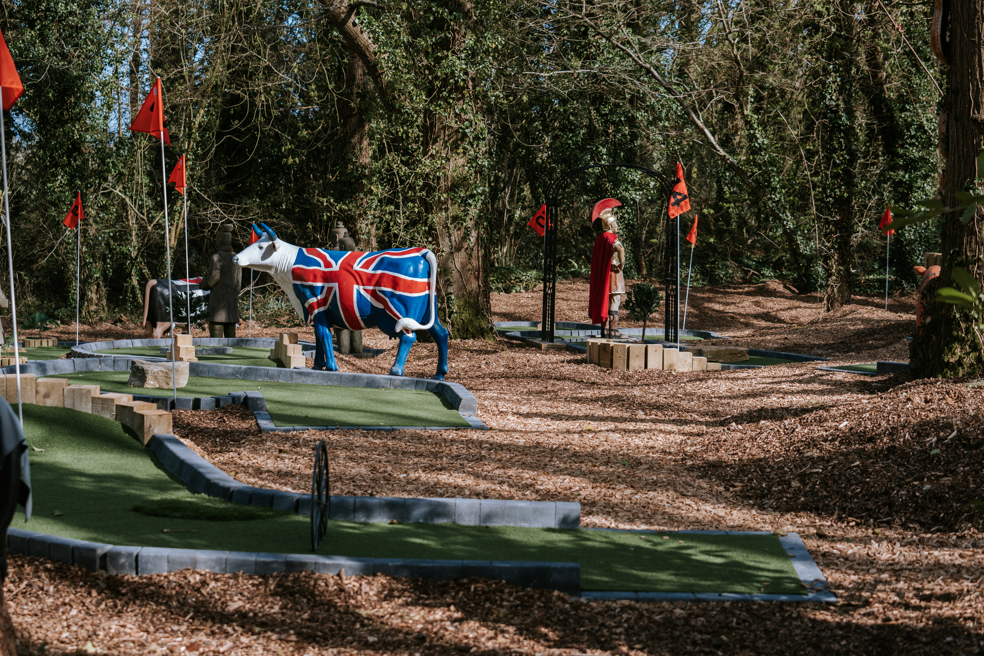crazy golf themed with cow statues