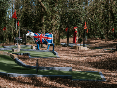 crazy golf themed with cow statues
