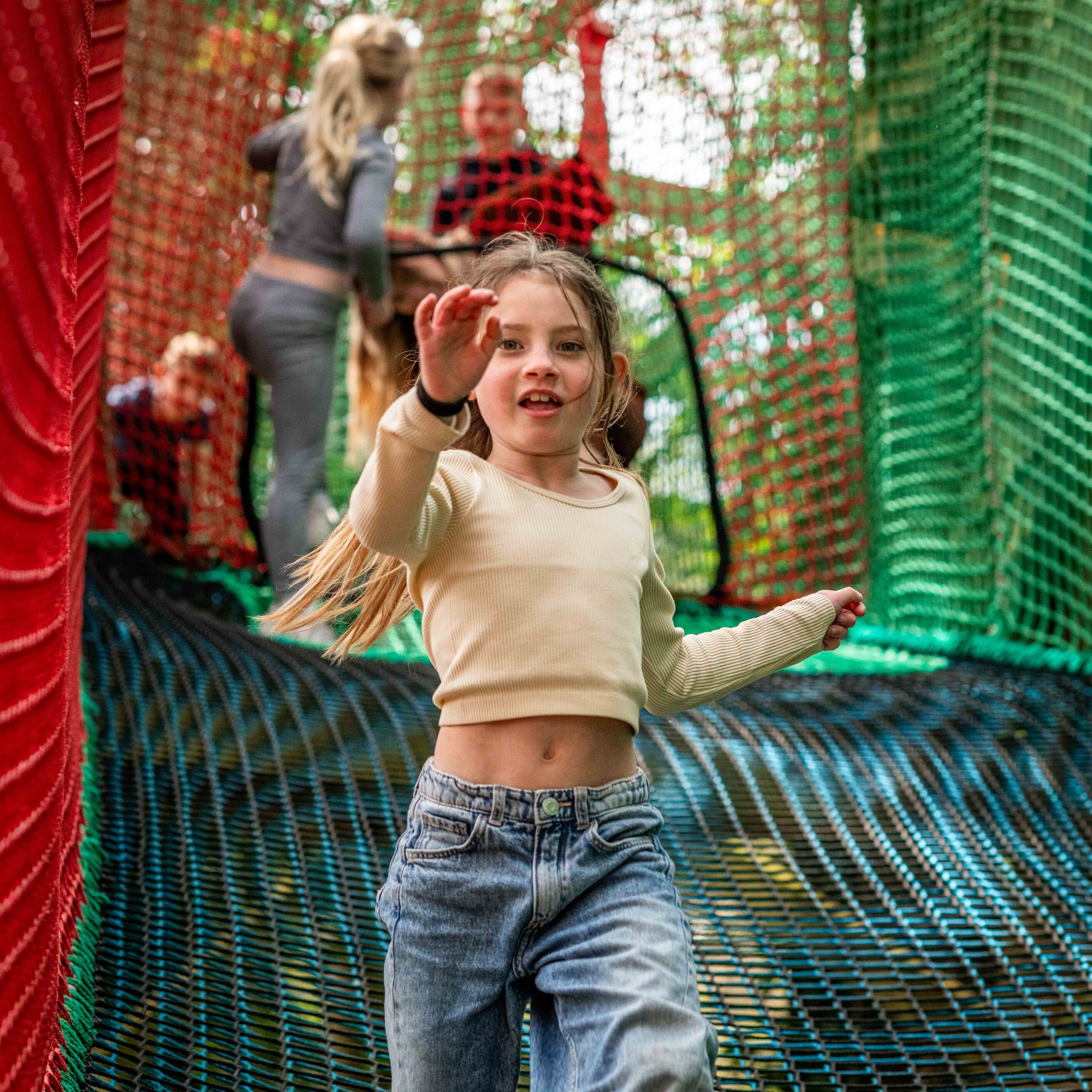 Girl running down sky nets