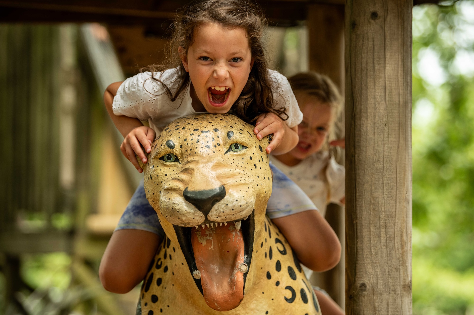 Girl on leopard Botswana