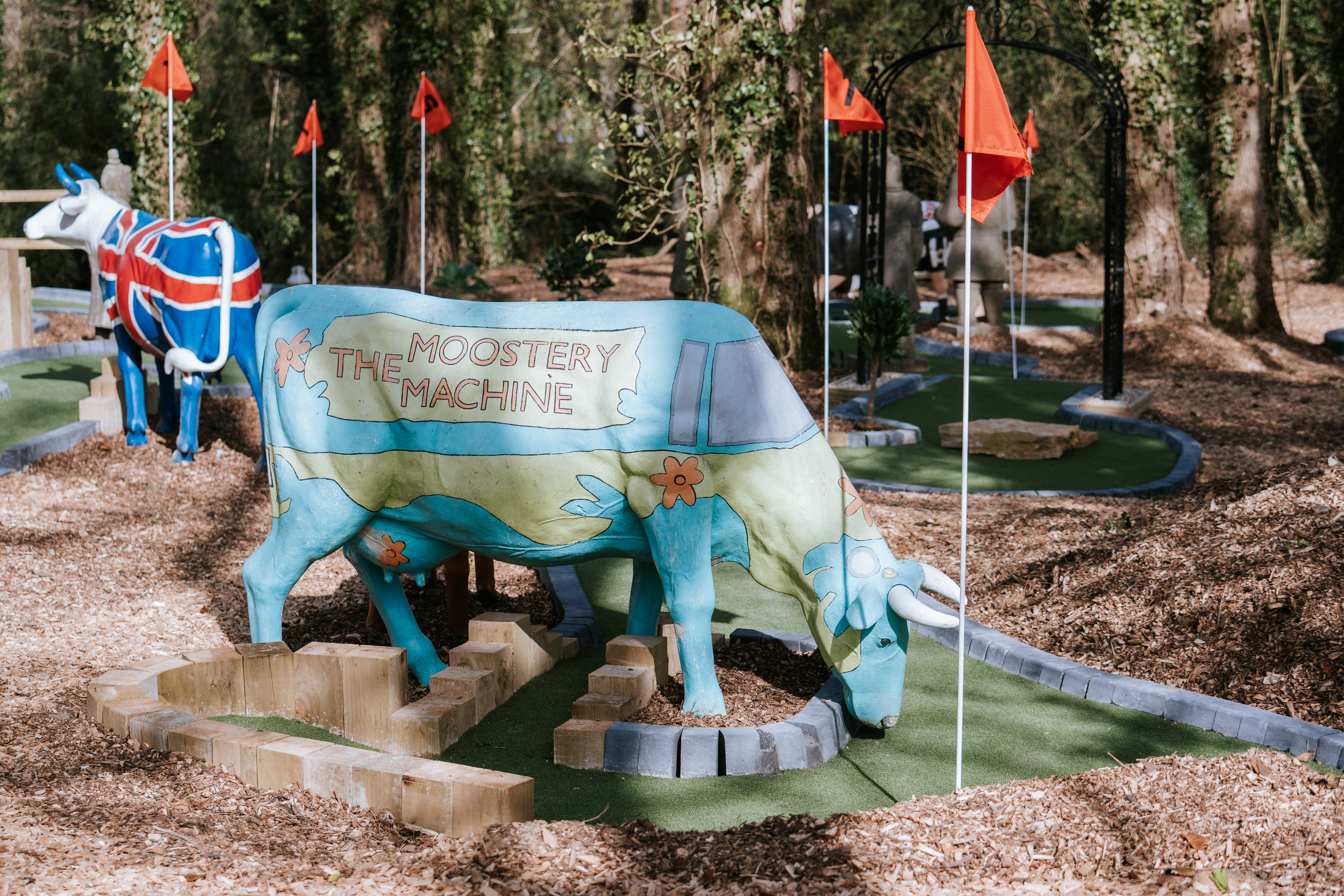 crazy golf themed with cow statues