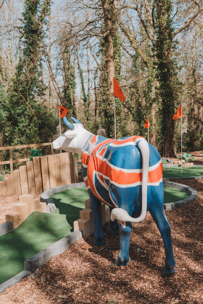 crazy golf themed with cow statues